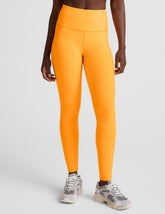 orange high-waisted midi length leggings.